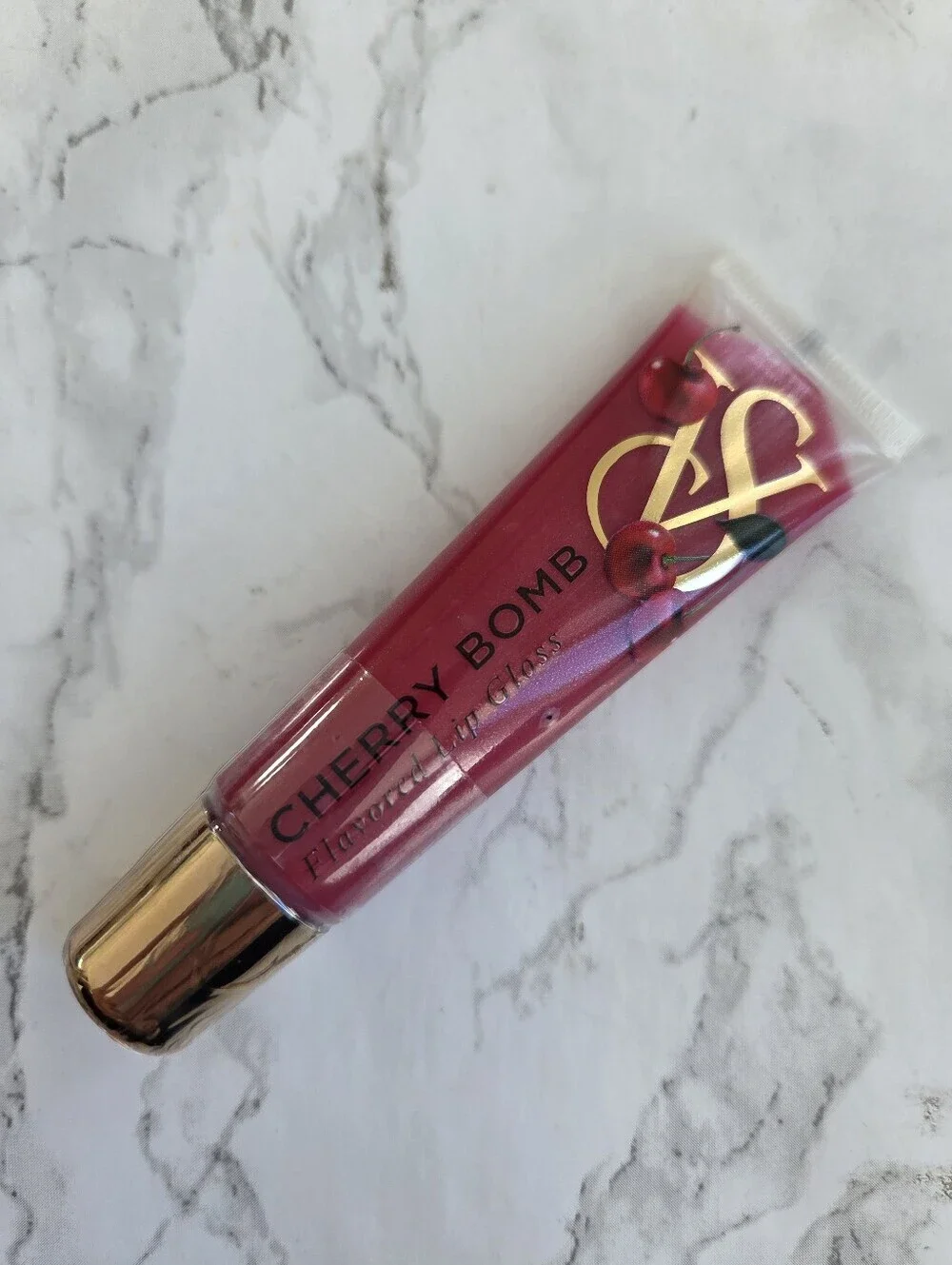 1 Victoria's Secret Lip Gloss  Flavored Favorities New